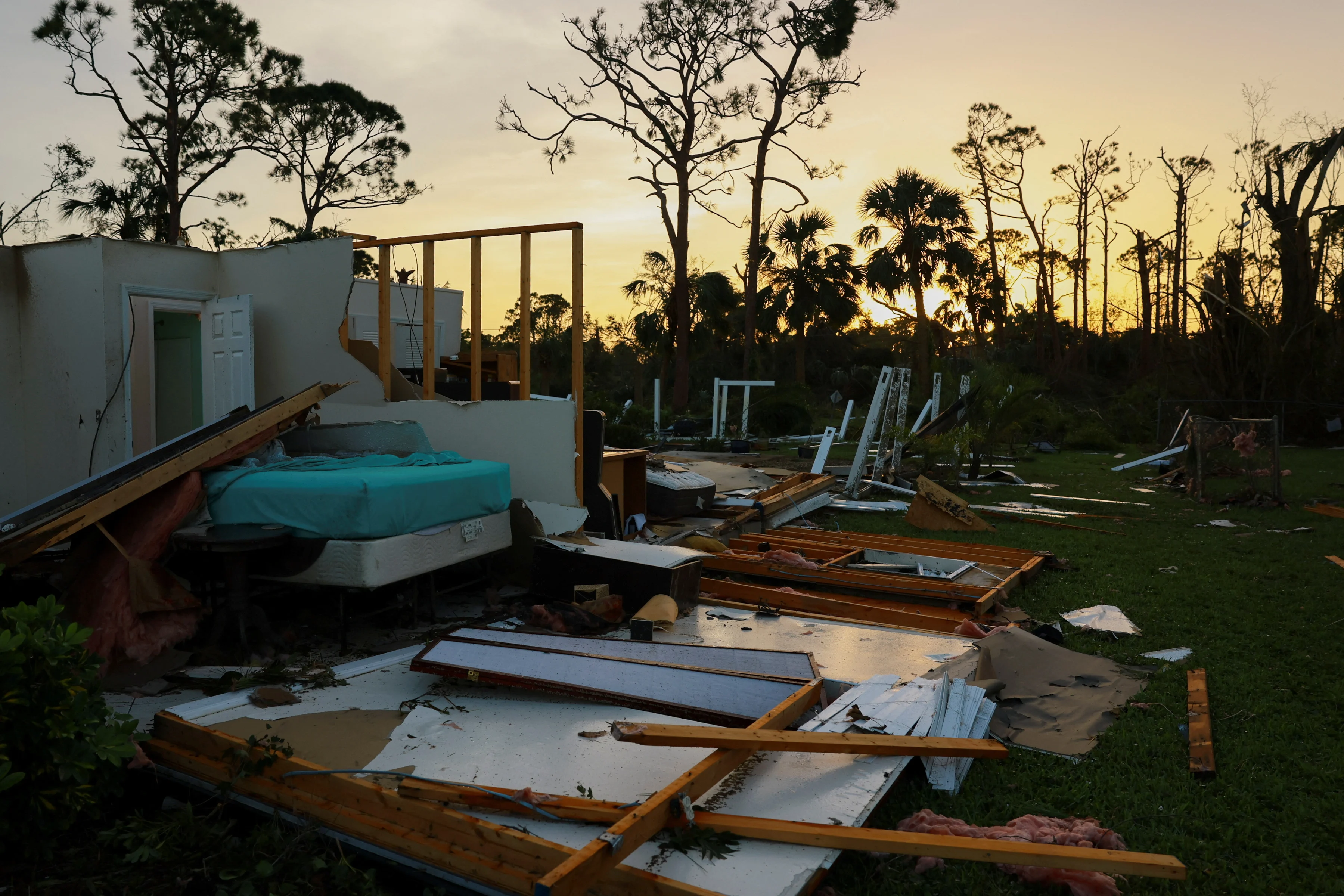 REUTERS: The remains of a building stand after Hurricane Milton made landfall, in Lakewood Park, near Fort Pierce, in St. Lucie County, Florida, U.S., October 10, 2024. REUTERS/Jose Luis Gonzalez