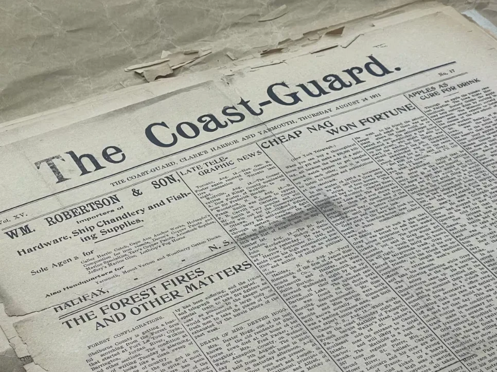 CBC: Weathered newspaper clippings at the Barrington Museum Complex, dated Aug. 24, 1911, state that Shelburne County was getting a 'fearful scorching' from forest fires. (Kayla Hounsell/CBC News)