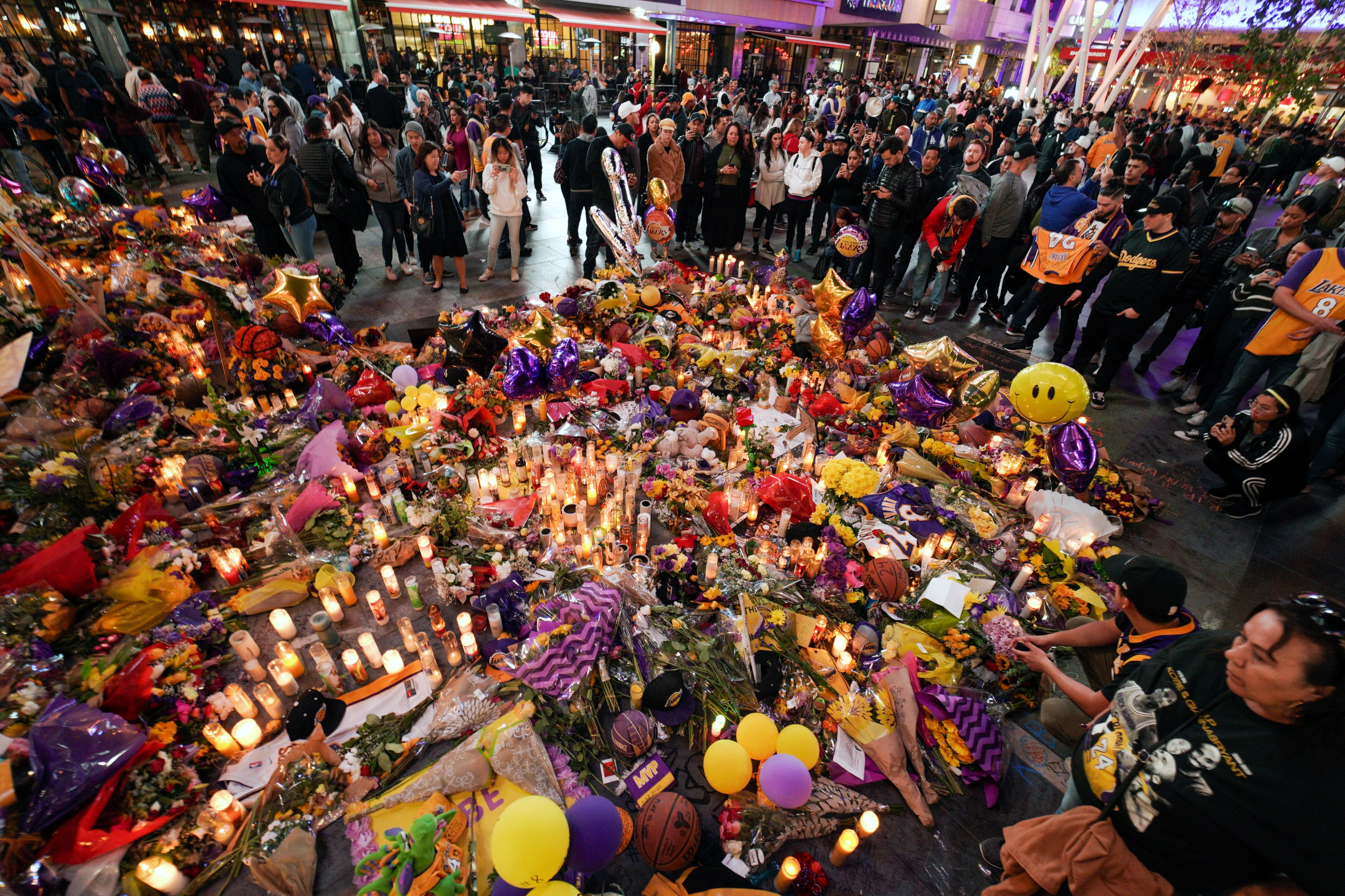 Reuters - Mourners gather near Staples Center