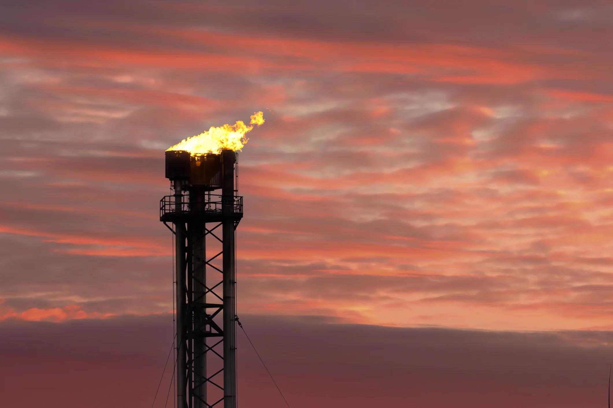 Gas plant flaring at a gas terminal in the United Kingdom. (Alexisaj/ iStock/ Getty Images Plus)