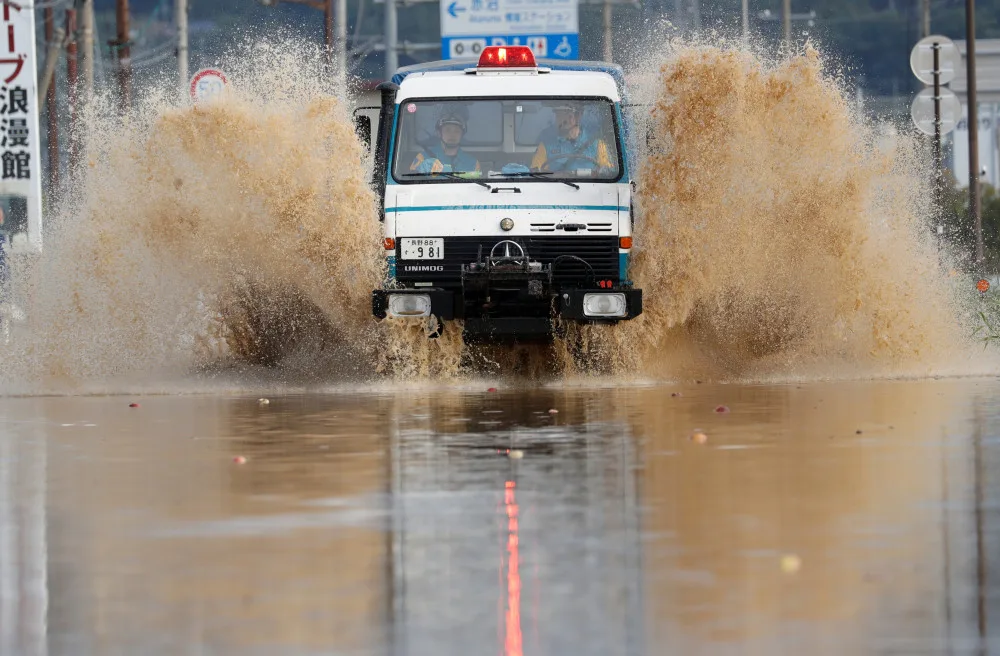 Rescuers search floodwaters for missing people in typhoon-hit Japan