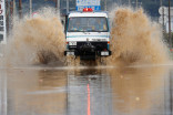 Rescuers search floodwaters for missing people in typhoon-hit Japan