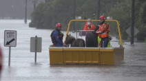 Floods hit southeast Australia, forcing thousands to evacuate