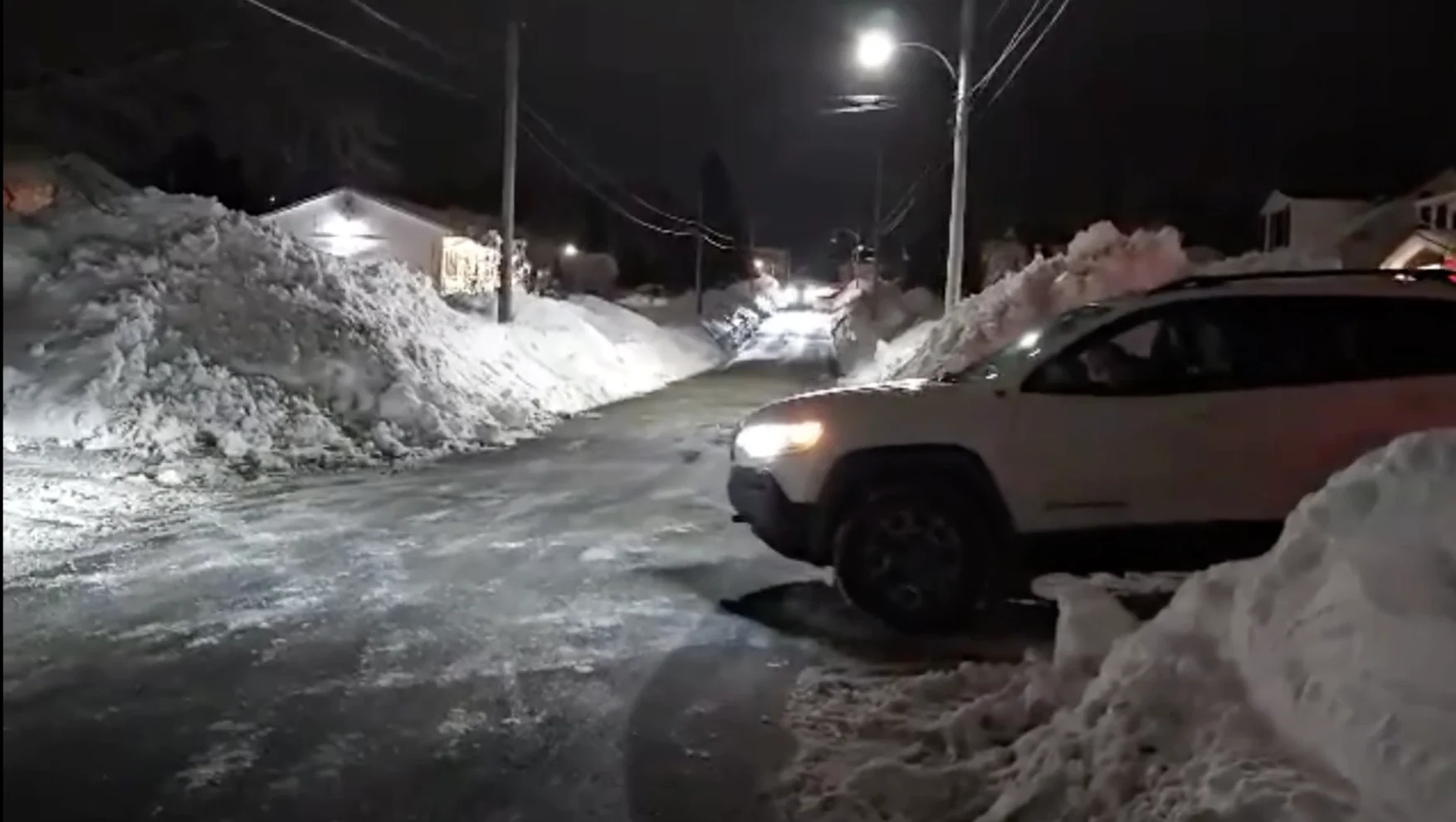 NATHAN COLEMAN: Towering snow piles in Sydney, Nova Scotia (Feb. 17, 2024) - 2