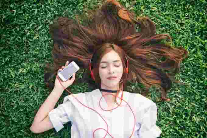 GettyImages-939443944 - woman with headphones