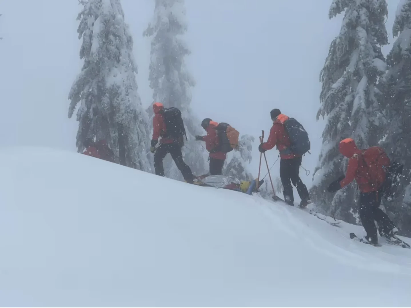 CBC: A North Shore Rescue crew moves the woman to safety. The organization says she was lucky to survive, and urge people heading into the mountains to check avalanche conditions. (North Shore Rescue)