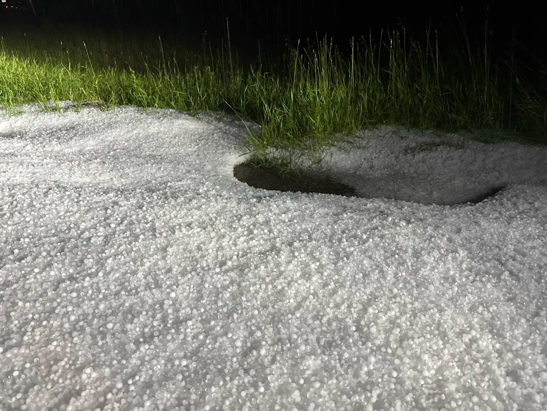 Braydon Morisseau - submitted: Hail along the Alberta foothills. Date shot: July 16, 2025