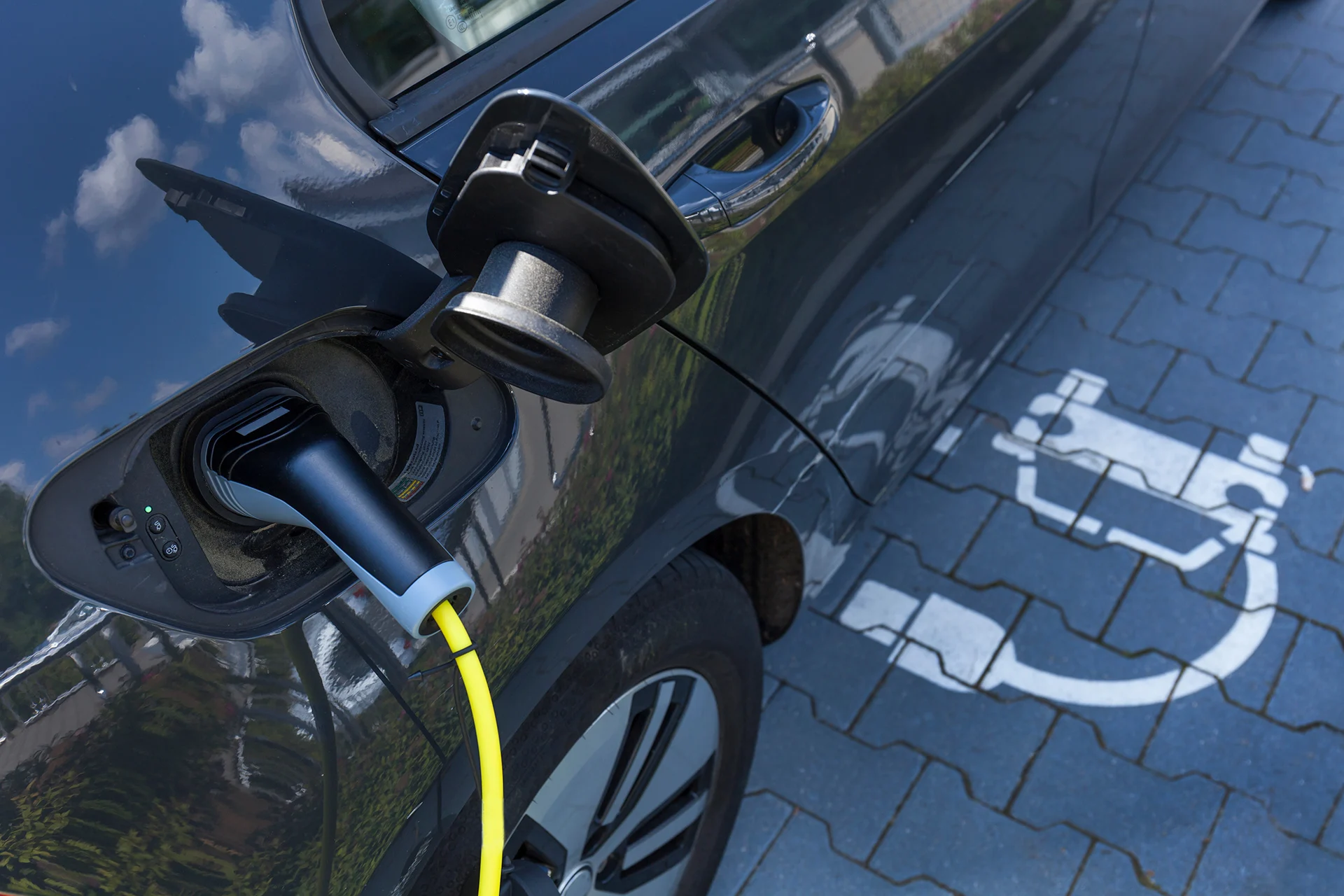 electric car charging Westend61. Getty Images.