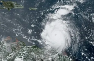 Hurricane Beryl drops to Category 4 strength after breaking records