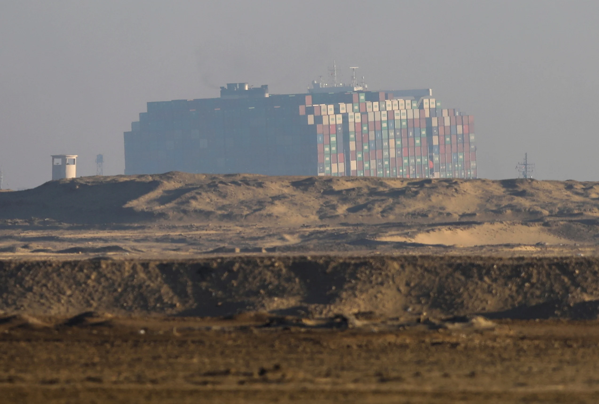 A view shows the container ship Ever Given, one of the world's largest container ships, in Suez Canal, Egypt March 29, 2021. REUTERS/Mohamed Abd El Ghany