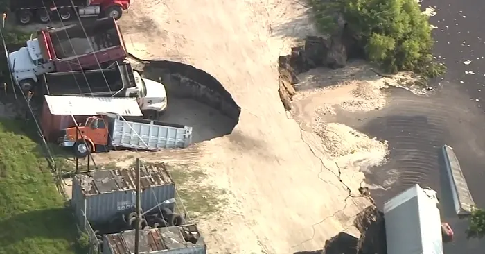 Massive Florida sinkhole swallows at least three trucks