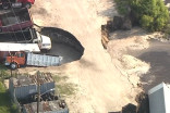Massive Florida sinkhole swallows at least three trucks