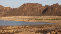 Dead bodies revealed as drought sucks U.S. lake dry