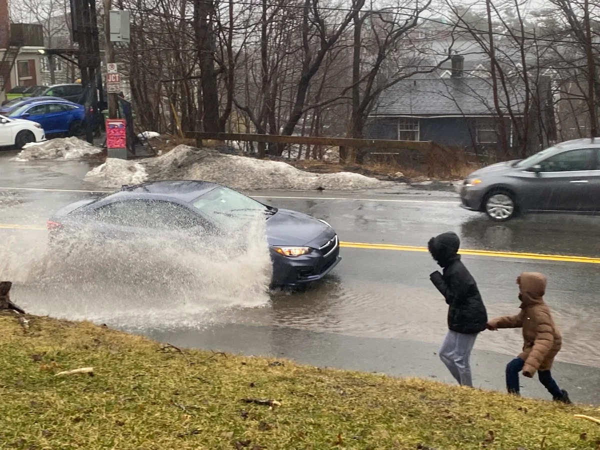 (Nathan Coleman) Car splashing puddle Halifax