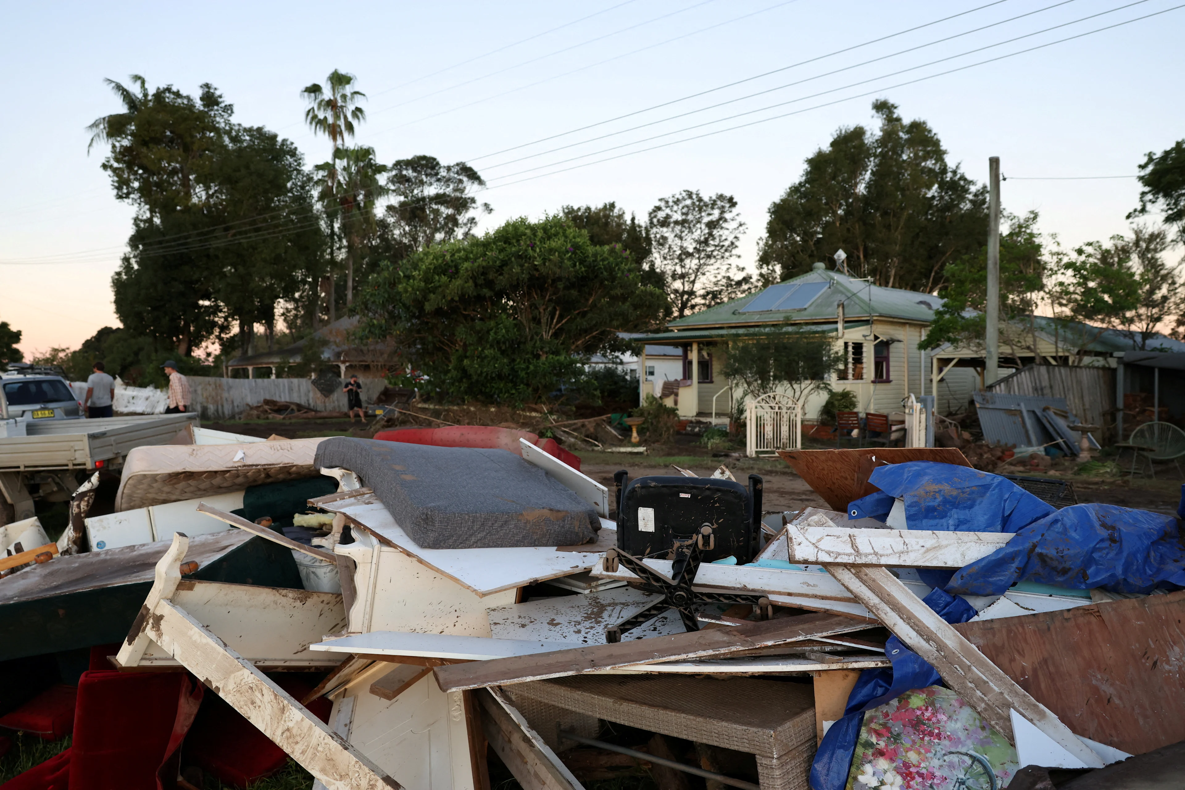 Debris lies outside a residential property in Glenthorne, Australia, May 24, 2025. REUTERS/Hollie Adams