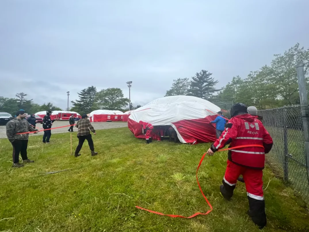 CBC: Multiple tents have been erected on a ball field in Shelburne County to house the roughly 300 firefighters who have come from all over Atlantic Canada, the U.S., and even as far away as Costa Rica, to provide relief. (Sam Samson/CBC)