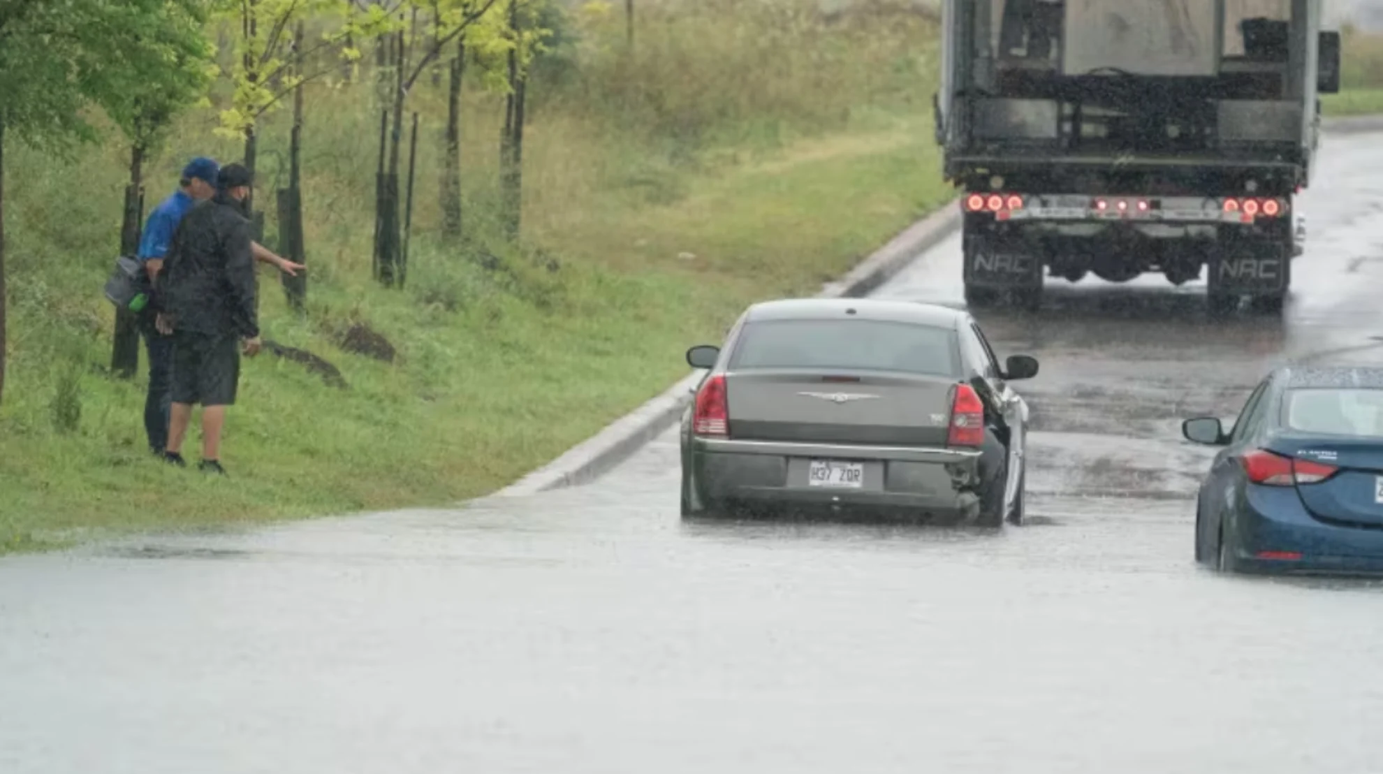 Floodwaters washed away the only road out, Quebec city sets up water taxi