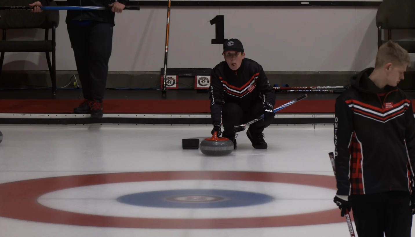 Connor O’Donovan | Team Ontario curler Meghan O’Donovan prepares to throw a stone at North Hill Curling Club in Calgary. 