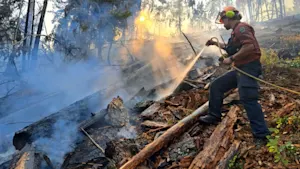 Thousands of wildfire evacuees are returning across B.C. as smoke moves into central areas
