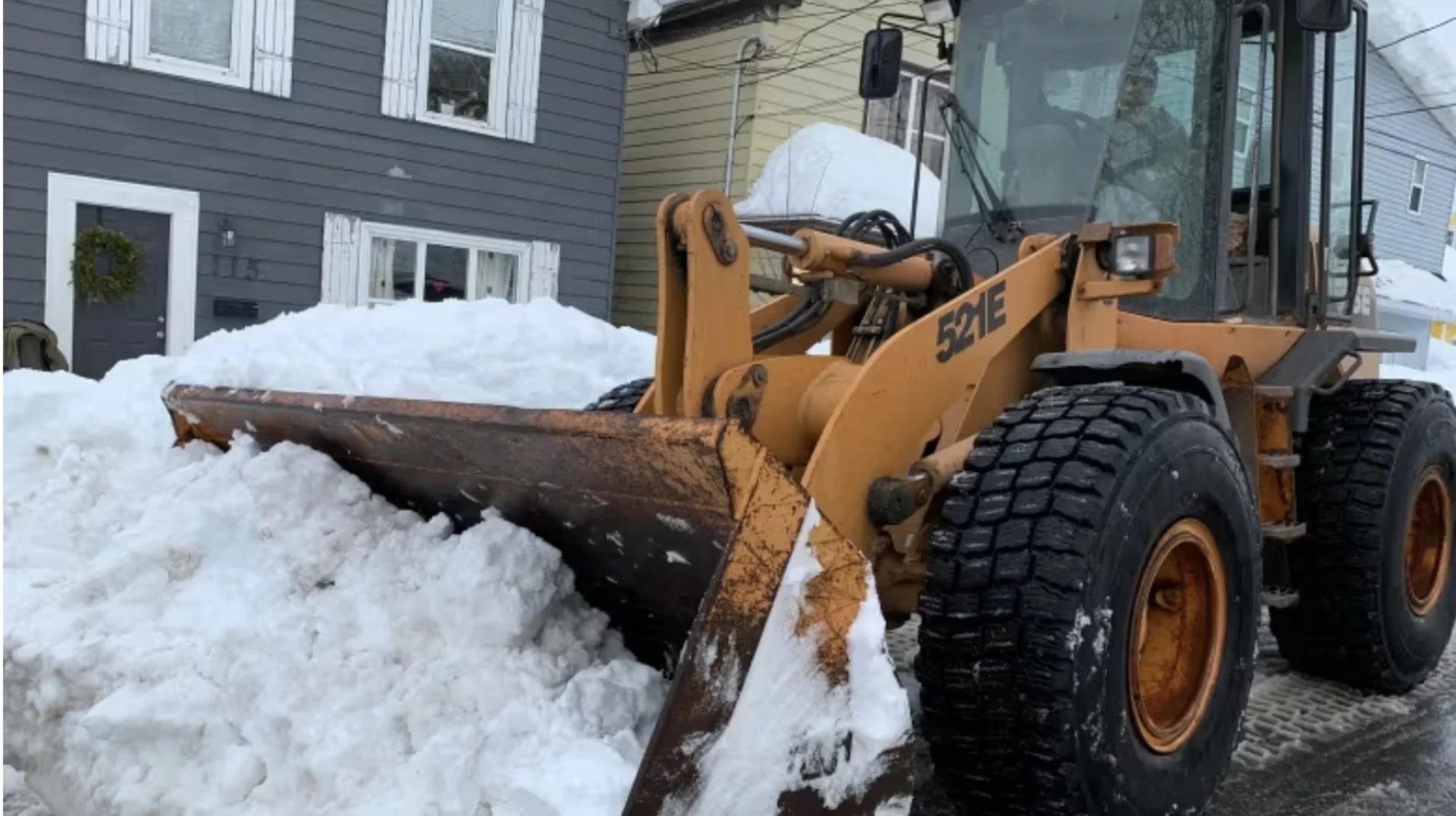 CBC: A wheel loader clears snow away in Sydney, N.S., on Feb. 6, 2024. (Shaina Luck/CBC)
