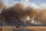 Wildfires in southern Alberta contained after village evacuated
