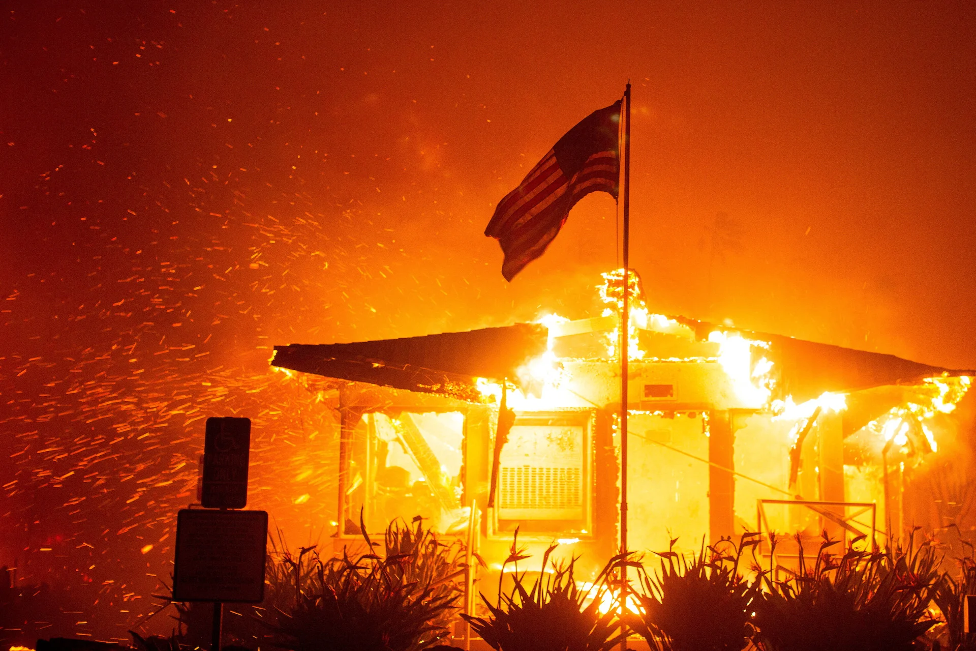 Los Angeles surrounded by out-of-control wildfires; at least 5 dead