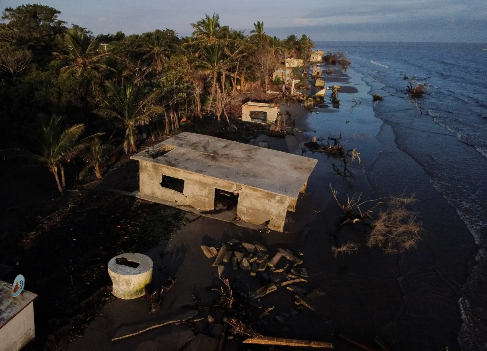 Mexican village blames climate change as sea swallows its homes