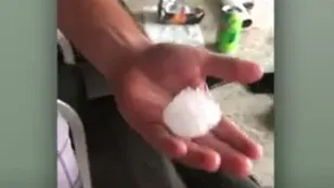 Caught on film: Golf ball-sized hail pummels boat during severe storm