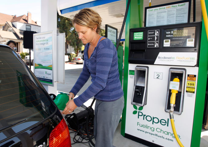 Casey Hiester fills her car with biodiesel fuel at a Propel gas station in Oakland, Calif. on Tuesday, Aug. 31, 2010. Hiester, an Oakland resident, had to drive into Berkeley to pump biodiesel until the station opened Tuesday. Propel plans on operating up to 20 stations in the Bay Area region. (Paul Chinn/ The San Francisco Chronicle/ Getty Images)