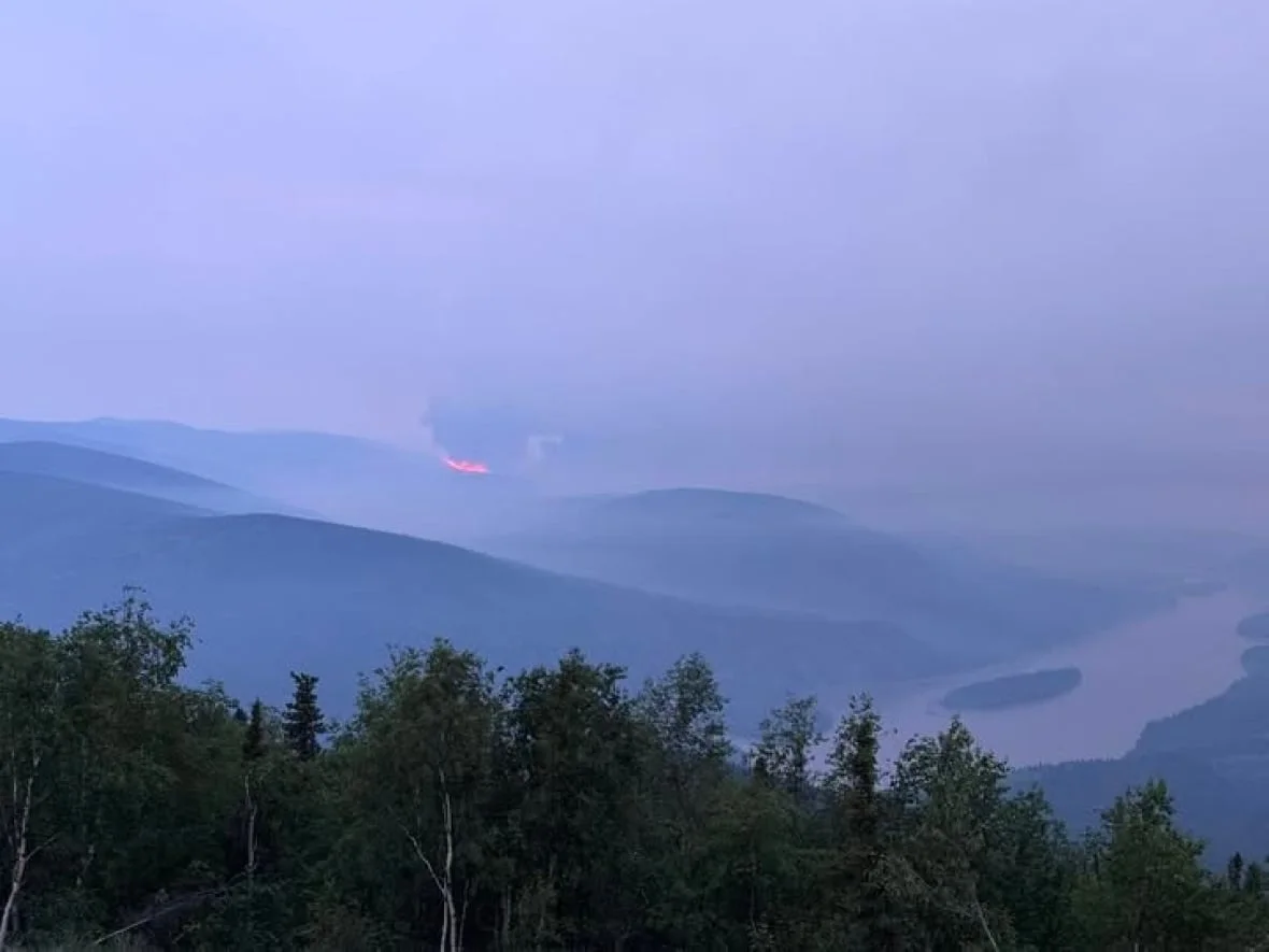A shot of the wildfire burning near West Dawson on Friday evening. (Laura-Lee Fried)