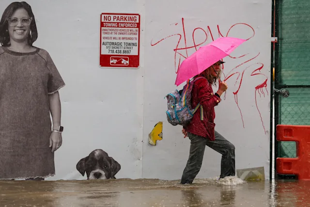 Streets turn into small lakes in New York as heavy rain triggers ...