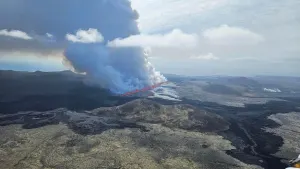 Iceland authorities declare emergency as volcano erupts, lava flows
