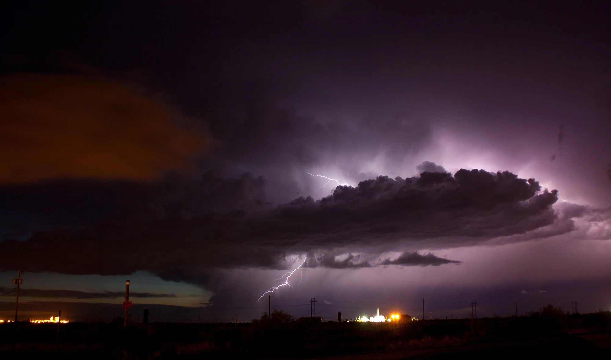 Lightning crackles over a truck stop in New Mexico, 2014. (Mark Robinson)