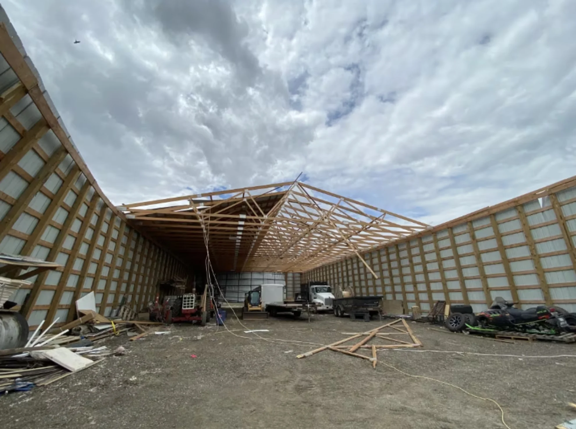 Tornado dismantles metal storage building southeast of Regina