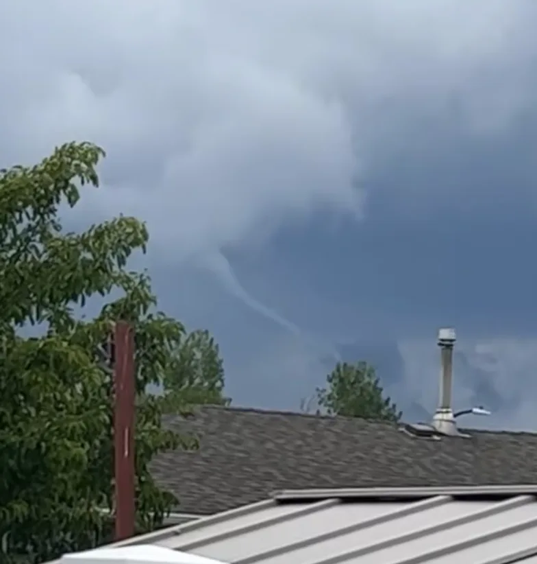 CBC: Melville resident Lacey Polk photographed what looked like two funnel clouds near her home on Monday around 3 p.m. CST. (Submitted by Lacey Polk)