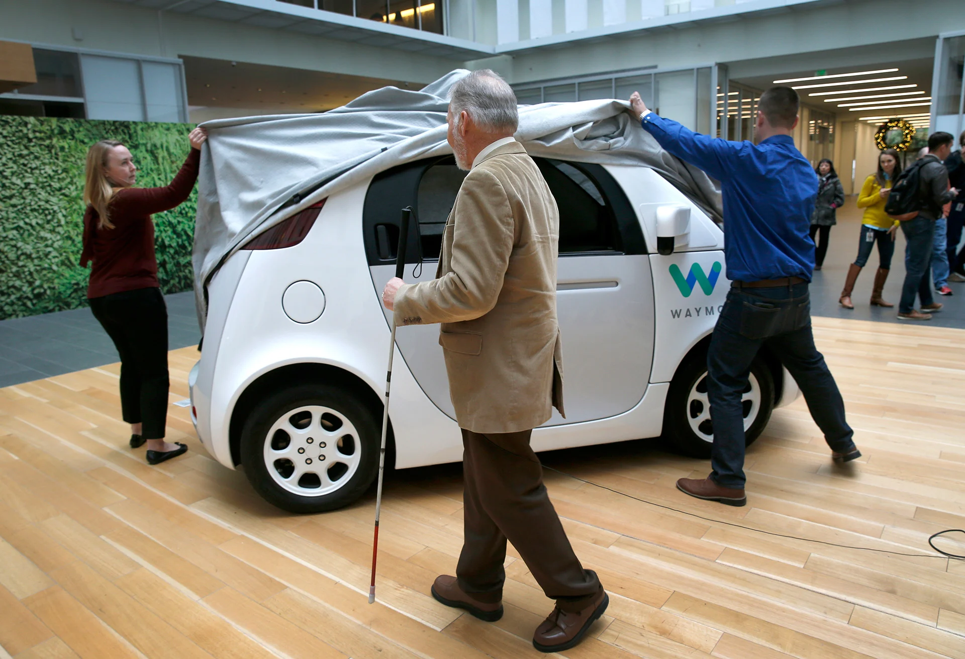 Steve Mahan, the blind first user of the Waymo, waits for employees to unveil the driverless car at Google's offices in San Francisco, California. (San Francisco Chronicle/Hearst Newspapers/ Getty Images)