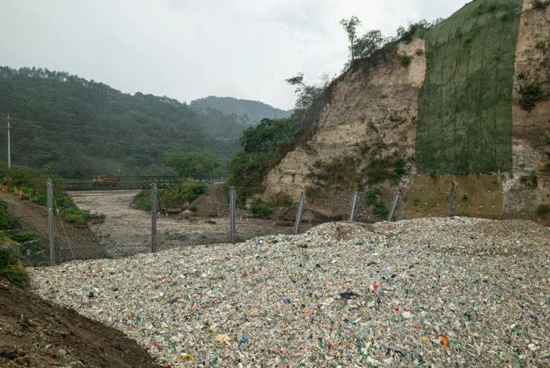 Interceptor 006 in Las Vacas river, Guatemala, during the start of the flash flood. The Ocean Cleanup’s first Interceptor Trashfence, piloted in May/June 2022. (The Ocean Cleanup)