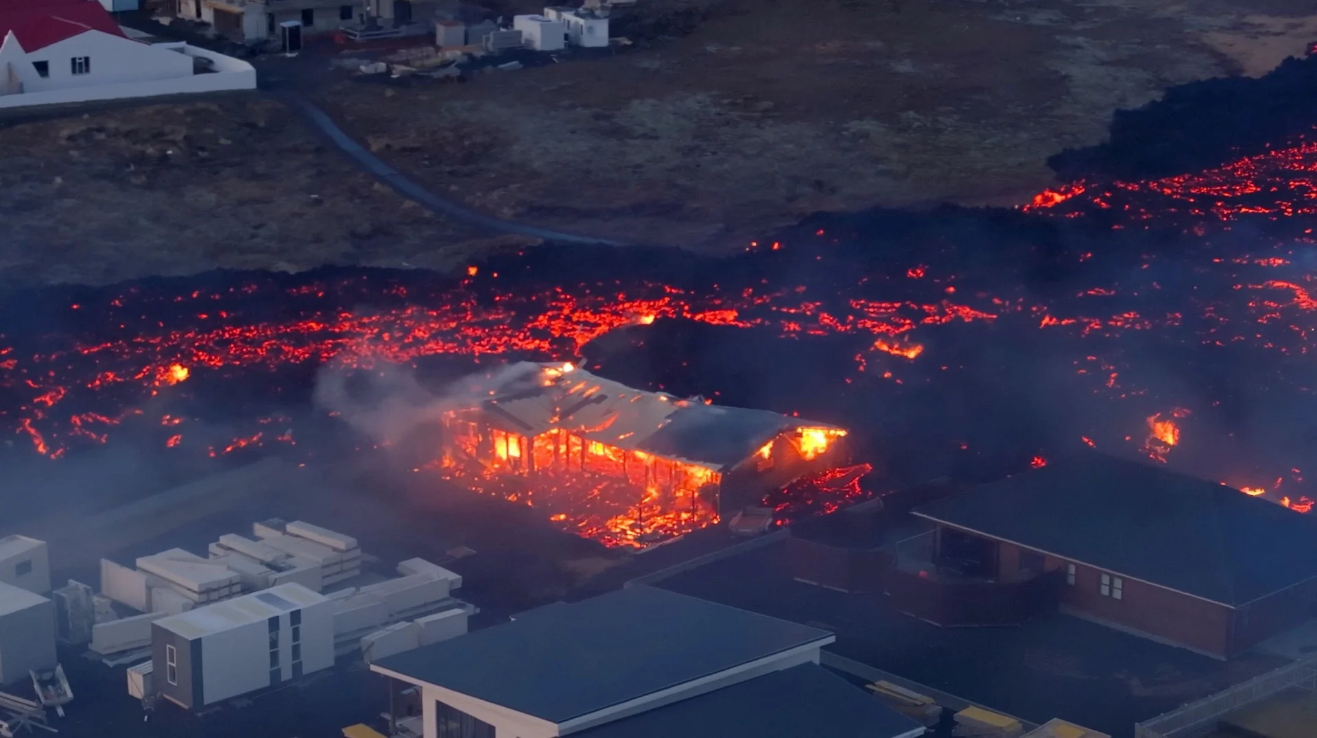 Iceland volcano recedes after 'black day' of town fires