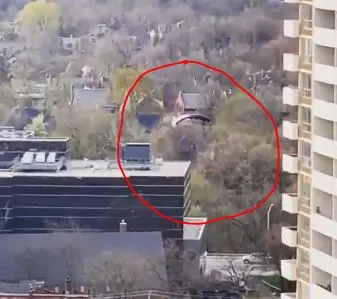 Video surfaces online of man parachuting into Toronto