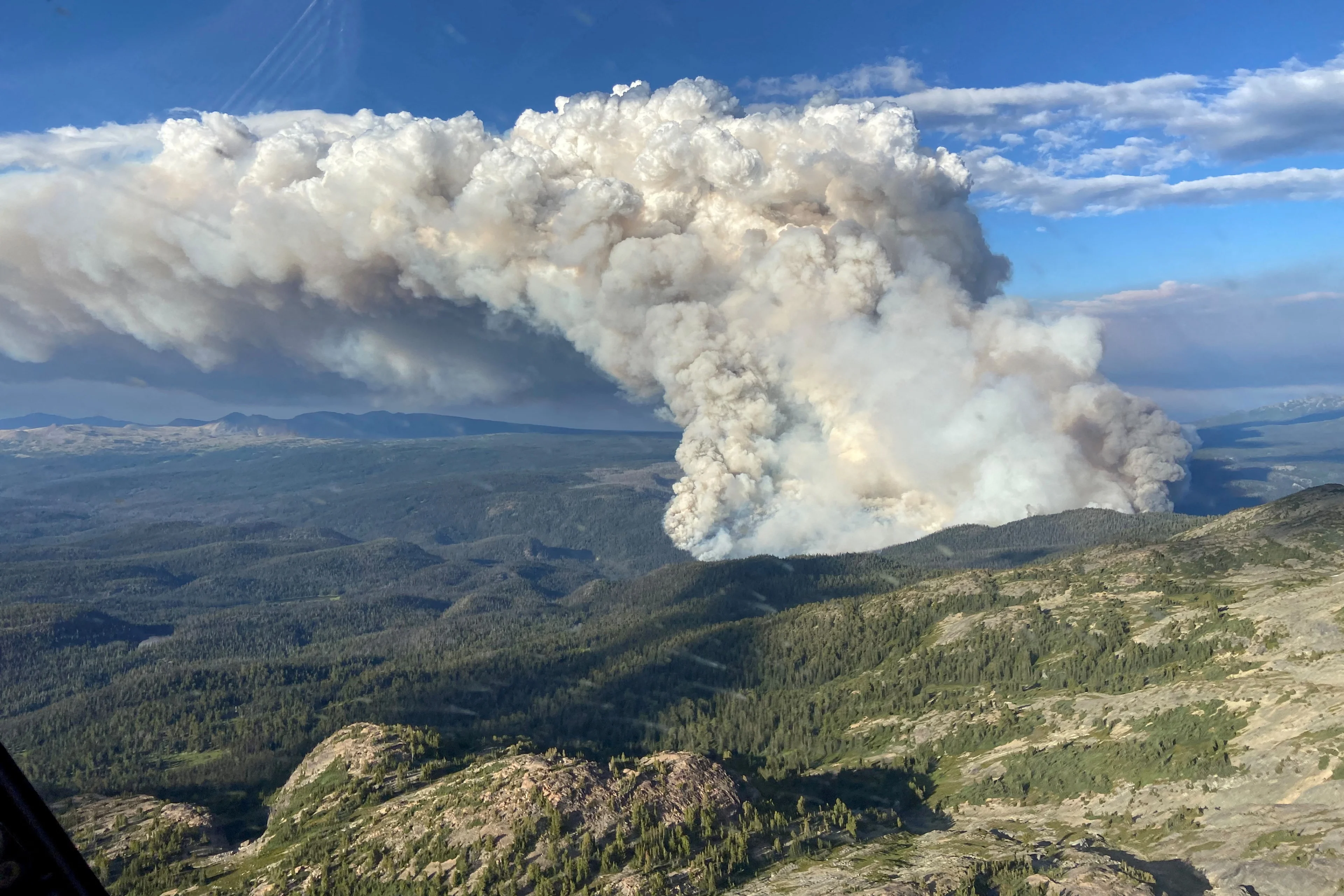 REUTERS: Smoke rises from the Young Creek wildfire (VA1735) in Tweedsmuir Provincial Park, west of Anahim Lake, British Columbia, Canada July 16, 2023. BC Wildfire Service/Handout via REUTERS/File Photo