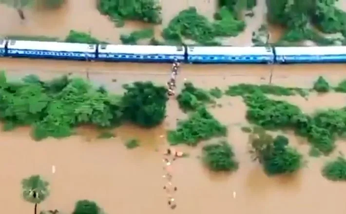 More than 1,000 people rescued from flood-stranded train in India