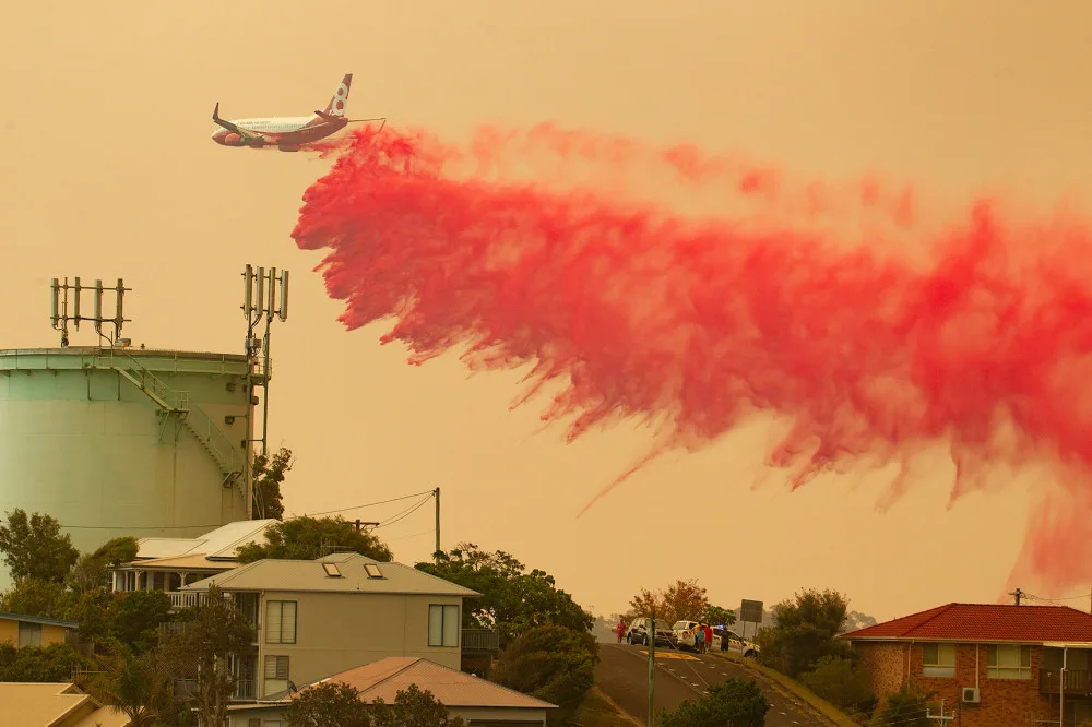 Australian bushfires kill three, destroy at least 150 homes