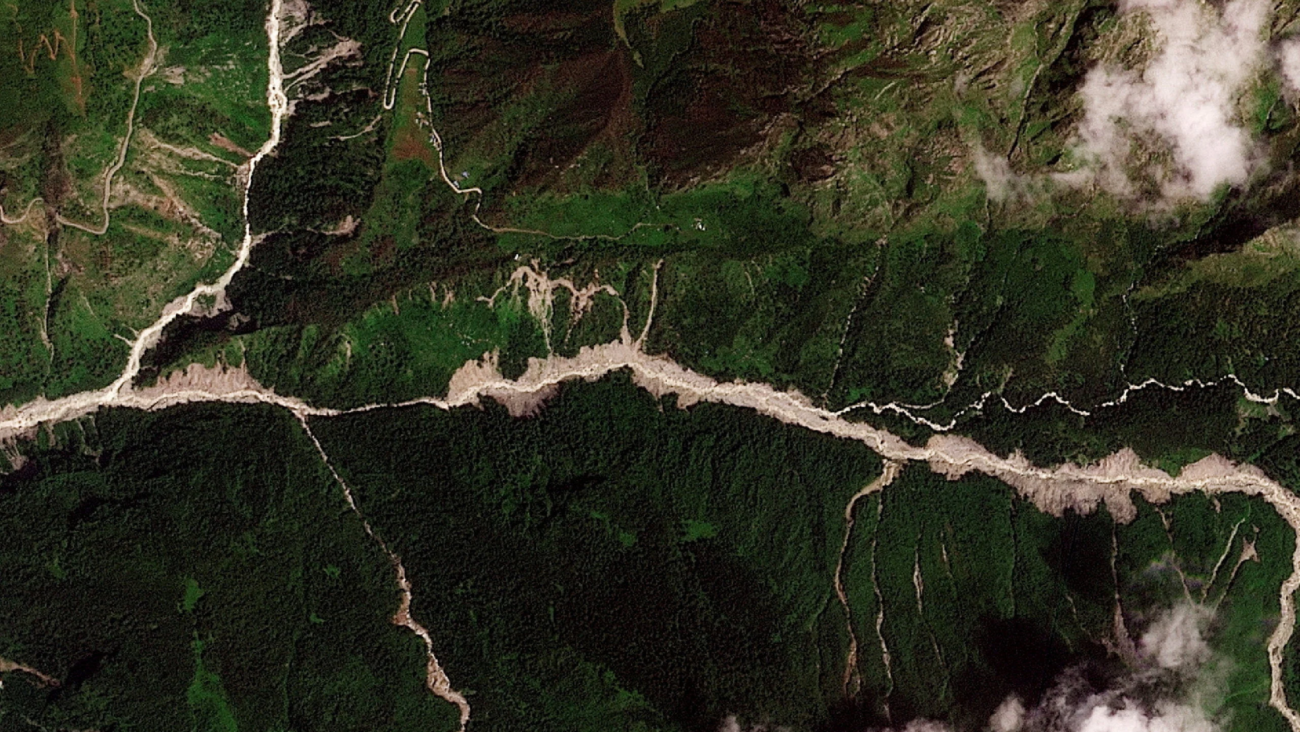 Satellite image shows the valleys near the Nepal-China border on August 25, 2026, before the devastating floods - 2026 PLANET LABS PBC - Handout via REUTERS