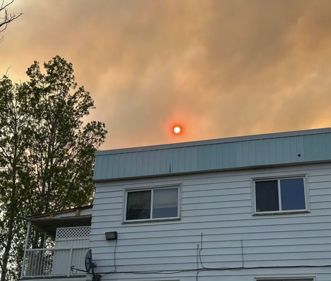 CBC: Wildfire smoke obscures the sun in Fort Nelson, B.C. (Submitted by Danielle Sassie)