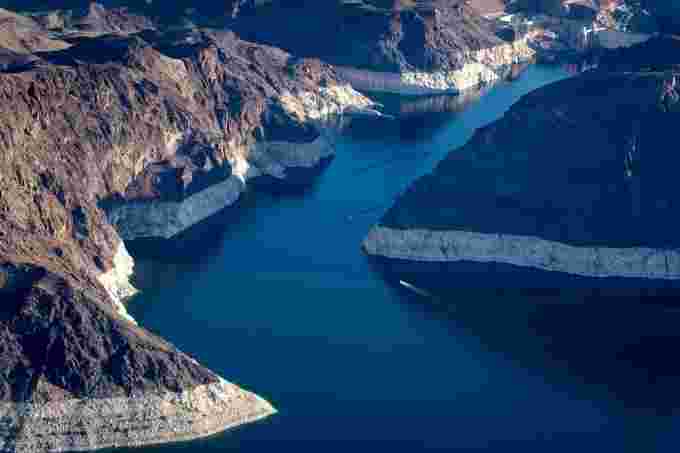 Hoover Dam (top right) and Lake Mead on May 11, 2021, on the Arizona and Nevada border. A high-water mark or bathtub ring is visible on the shoreline. (USA TODAY NETWORK via Reuters Connect)