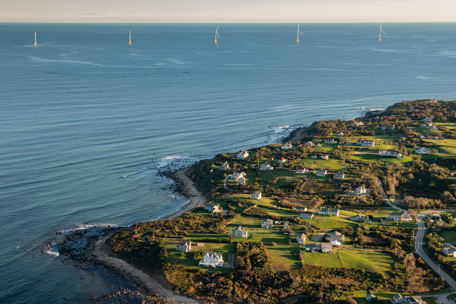 Block Island Wind Farm in the distance is the first commercial offshore wind farm in the U.S., located 3.8 miles (6.1 km) southeast of Block Island in the Atlantic Ocean. (Neil Ever Osborne)