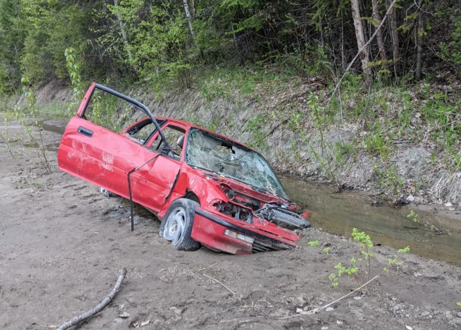 CBC File Photo: A car stuck in the mud along West Fraser Road in Quesnel after washouts and slides in 2018. (Steve Anderson/Contributed )