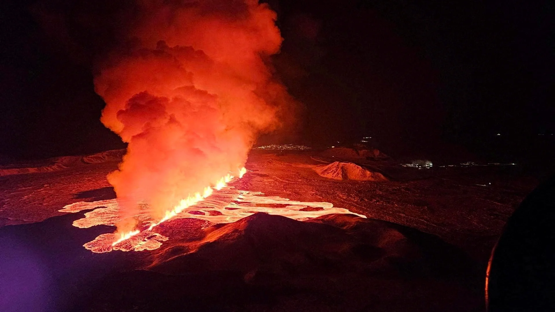Reuters: A volcano spews lava and smoke as it erupts on Reykjanes Peninsula, Iceland, February 8, 2024. Iceland Civil Protection/Handout via REUTERS