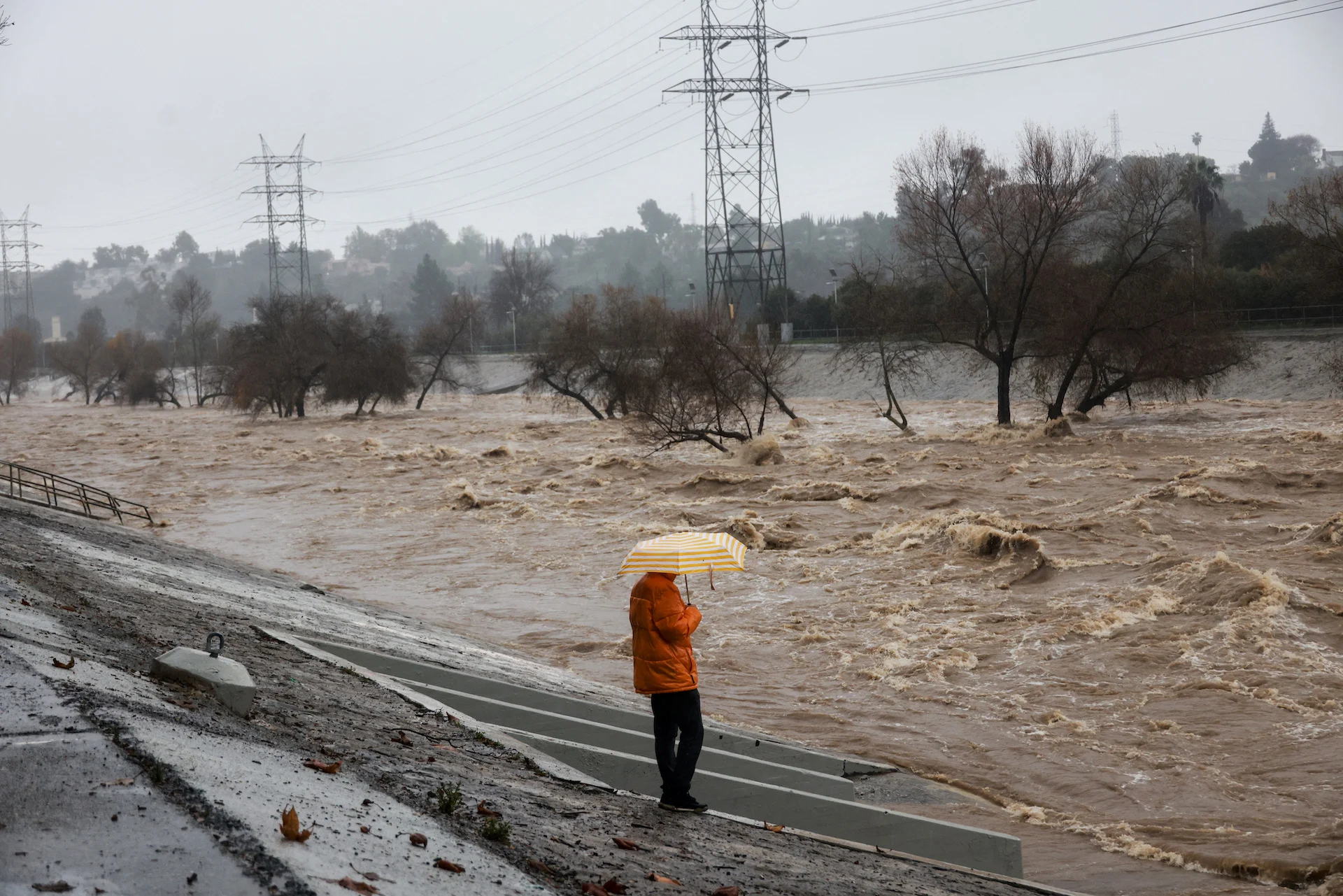 Lingering atmospheric river soaks California, threatens more flooding, mudslides