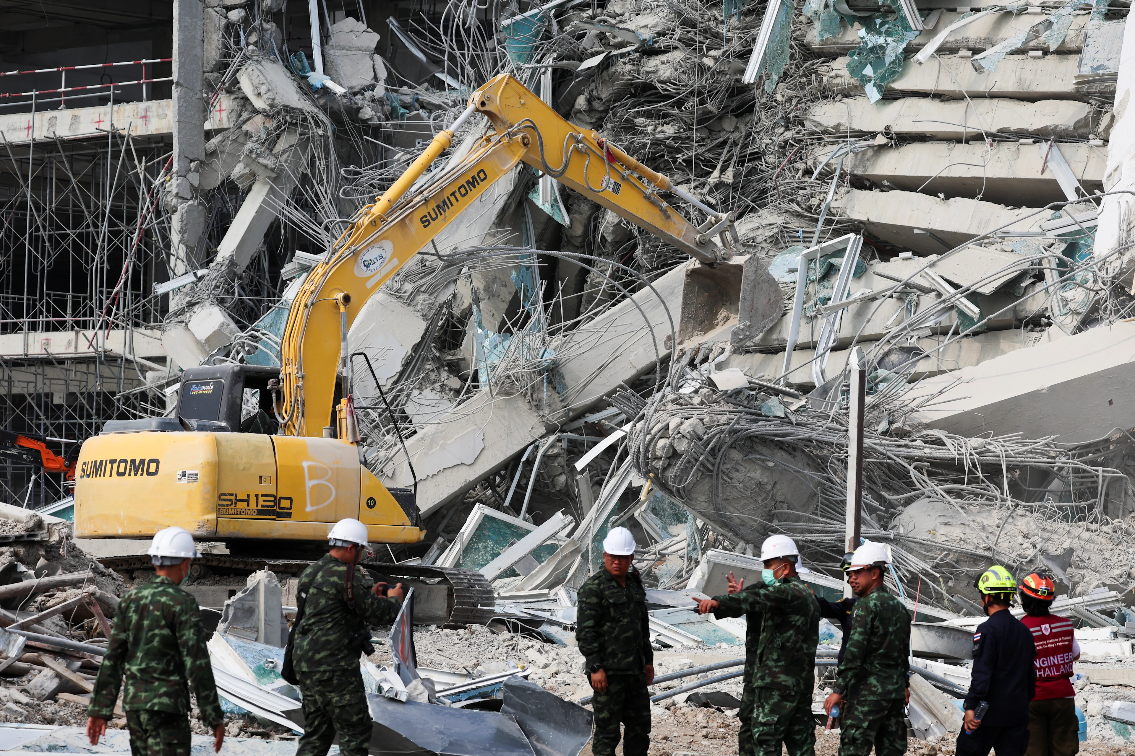 REUTERS: Rescue personnel work at the site of a building that collapsed, following a strong earthquake, in Bangkok, Thailand, March 29, 2025. REUTERS/Chalinee Thirasupa
